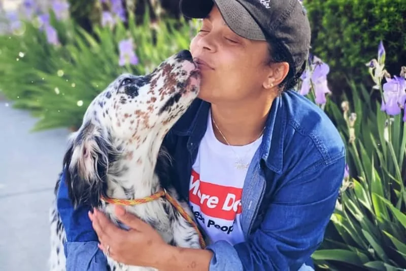 A pet-marketplace customer with her dog